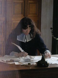 Bayle, en cire, &agrave; son bureau