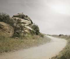 Photo, route d&eacute;serte qui tourne, dans un paysage rocheux