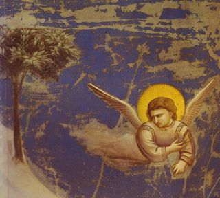 Un ange dans le ciel, au-dessus d'un arbre